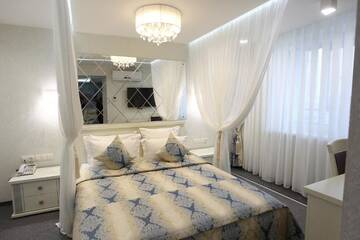 Фото номера Люкс с кроватью размера &quot;king-size&quot; и джакузи Отель Hotel Alesya г. Солигорск 7